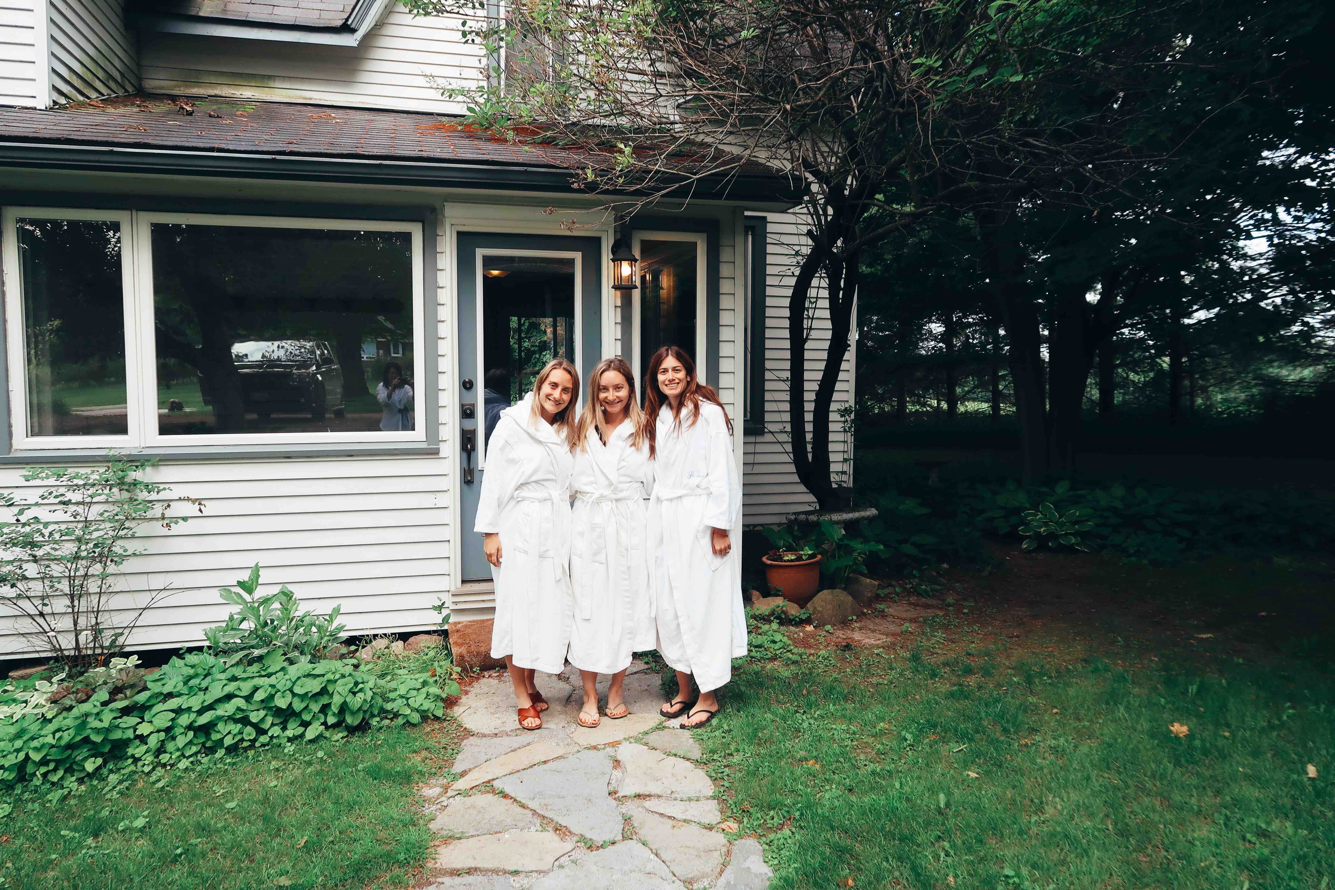 jordana hart toronto nutritionist and blogger and two friends at ste annes spa smiling in white robes